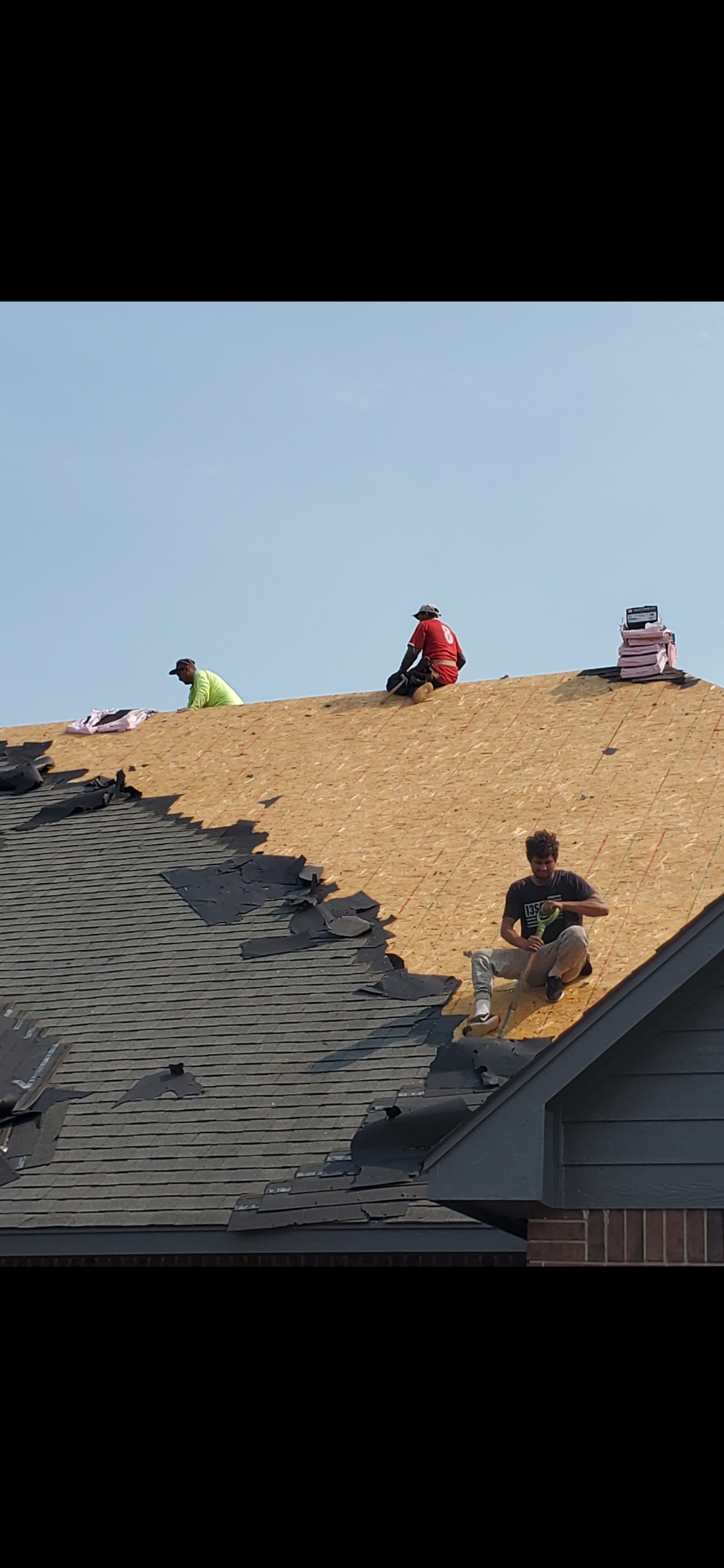 Conner Roofing crew on a roof in Tulsa